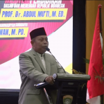 Ketua PDM Surabaya, M Ridlwan, menyampaikan sambutan dalam Silaturrahim Syawalan Guru dan Tenaga Kependidikan Muhammadiyah Sekolah dan Madrasah se-Surabaya yang digelar di Smamda Tower, Surabaya pada Rabu (23/4/2025). (Foto: Ubay NA)